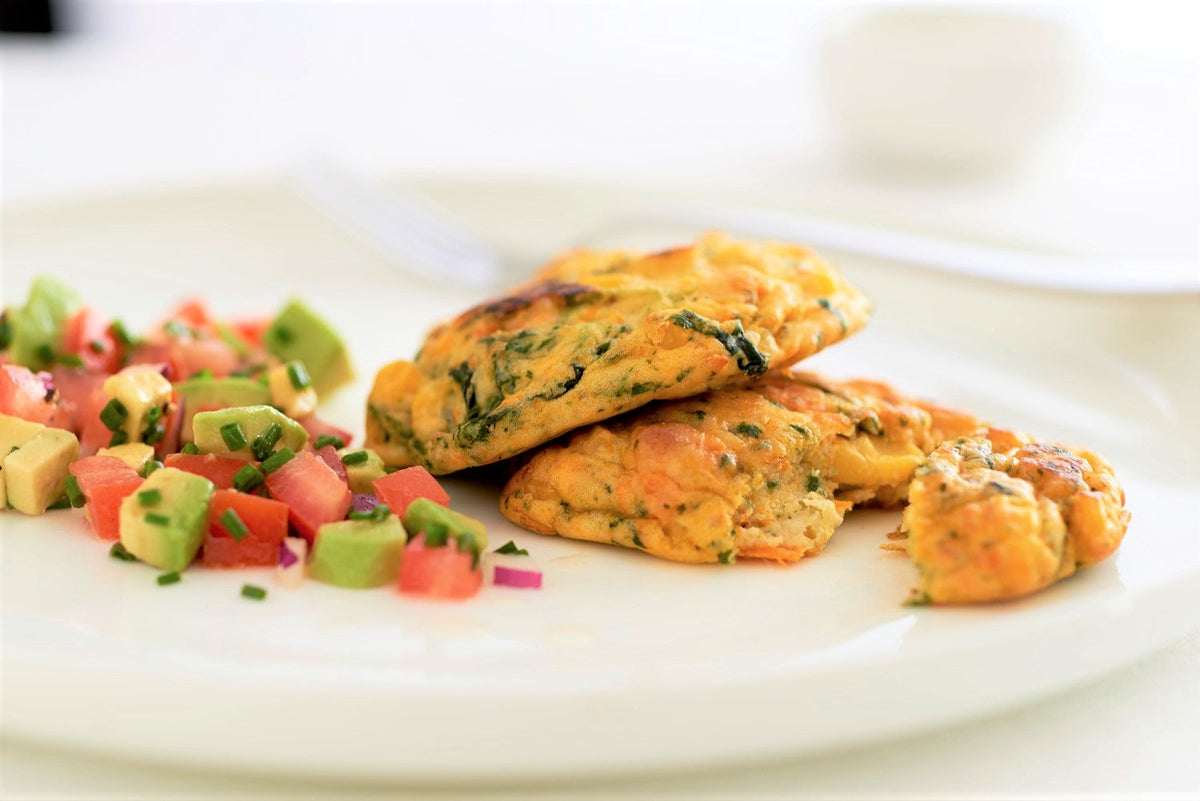 Roast Pumpkin, Spinach & Fetta Fritters served with avocado and tomato salsa