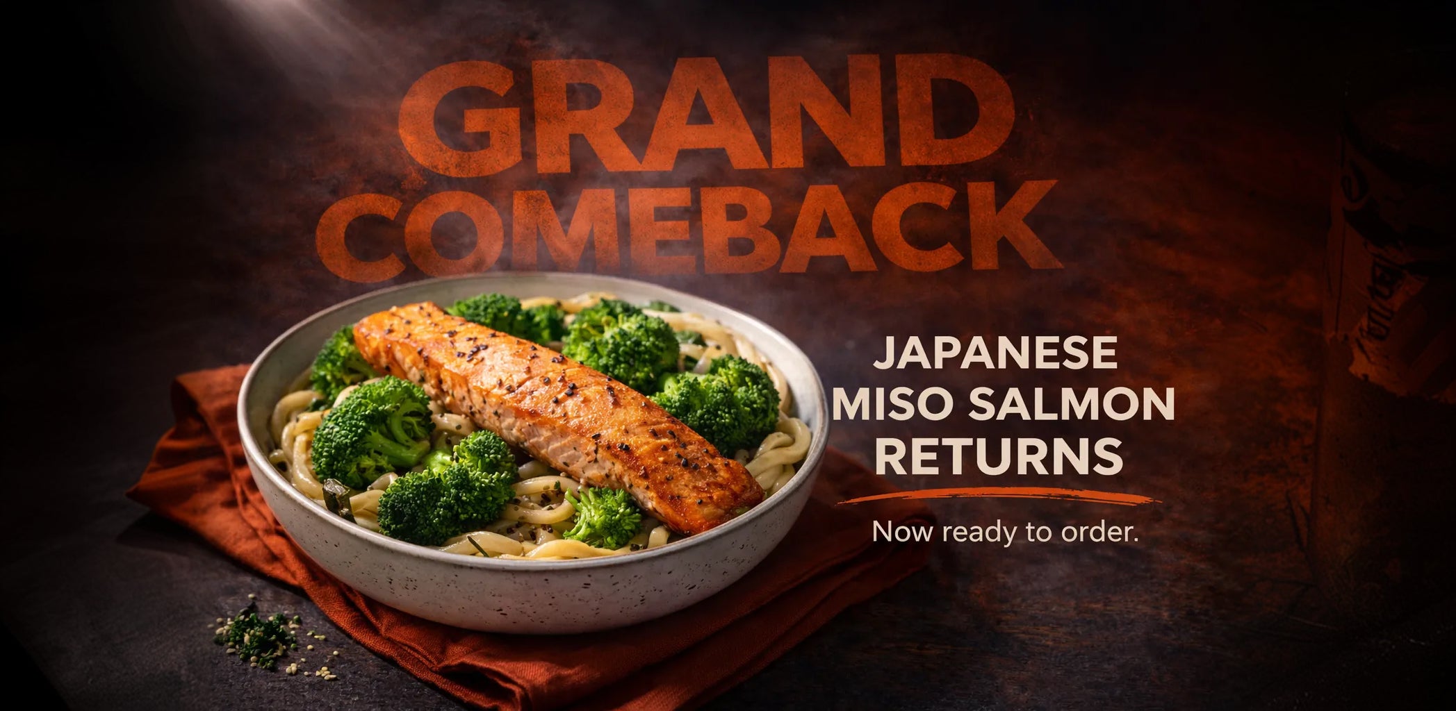 Bowl of salmon and vegetables with promotional text for 'Grand Comeback' on a dark background